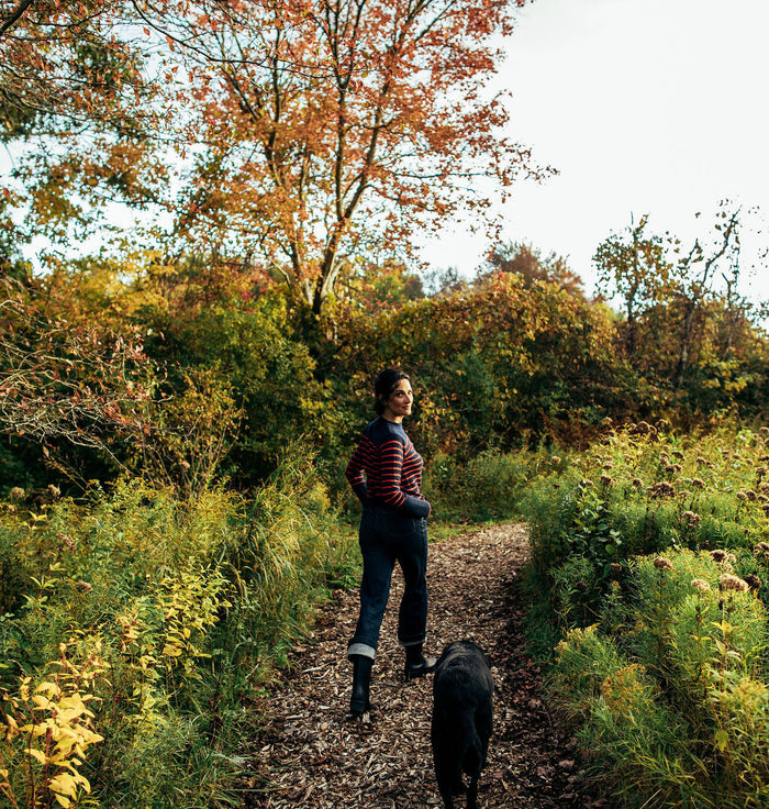 Dr. Catherine Price walking her black lab in Newport