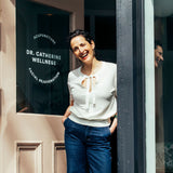 Dr. Catherine Price outside her Newport studio